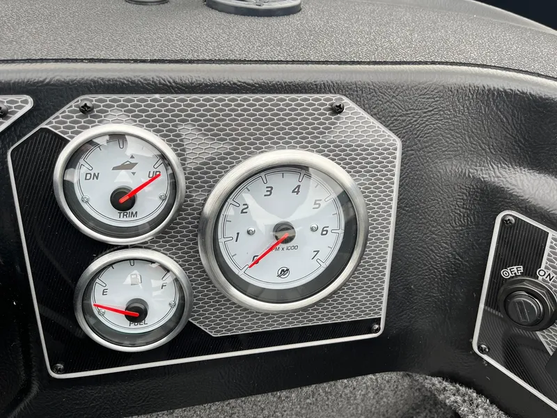 Slide: The Image of Dashboard of 2025 Lund 1875 Impact XS SS boat with gauges and controls. - 20