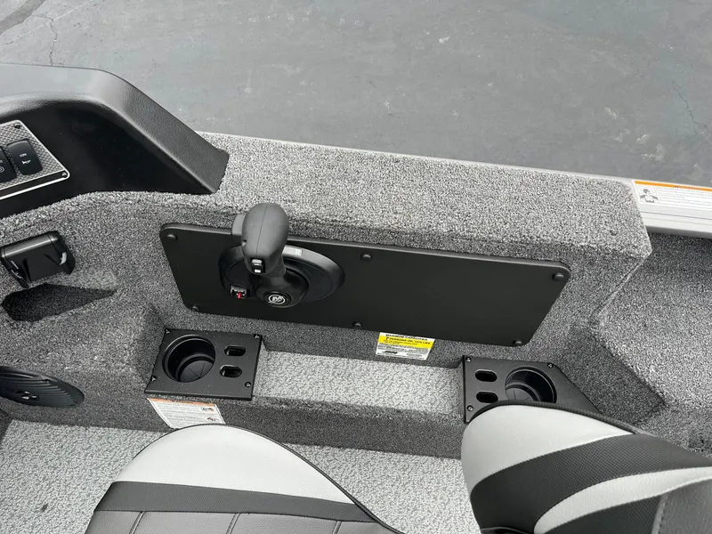 Slide: The Image of Interior of 2025 Lund 1875 Impact XS SS boat with control panel and seating. - 25