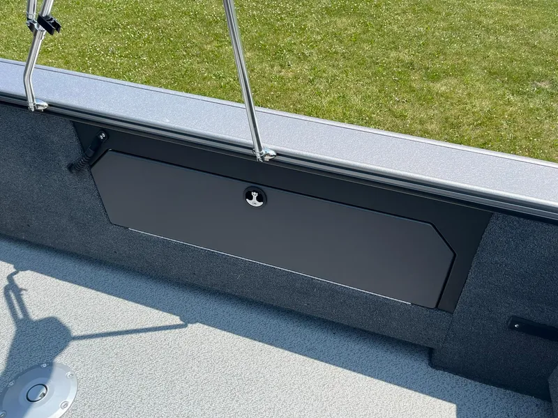 Slide: The Image of 2025 Lund 2075 Fisherman boat interior storage compartment. - 25