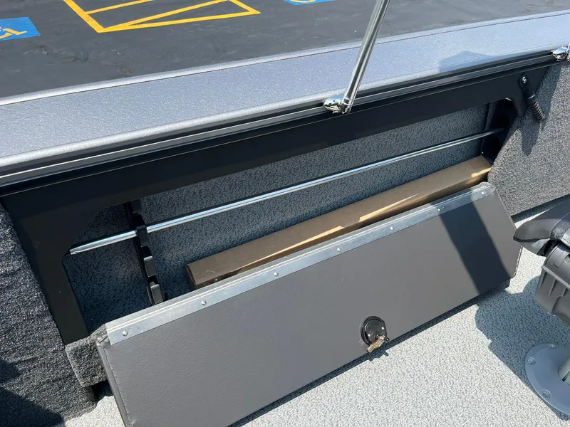 Slide: The Image of 2025 Lund 2075 Fisherman boat interior storage compartment. - 28