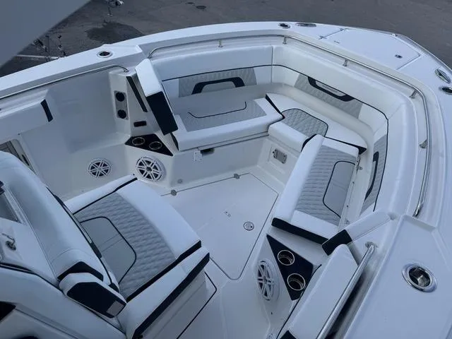 Slide: The Image of 2024 Blackfin 302CC boat dashboard with advanced navigation and control systems. - 14