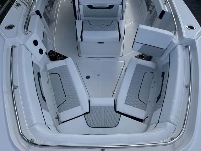 Slide: The Image of Outdoor dealership displaying Yamaha and Sea-Doo products, including jet skis and golf carts. - 16