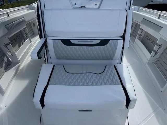 Slide: The Image of Showroom filled with various motorcycles and gear. - 18