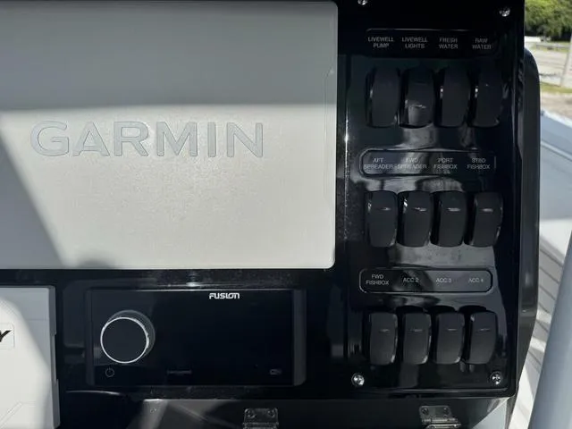 Slide: The Image of Outdoor dealership showcasing jet skis and boats, including 2024 Blackfin 302CC models. - 24