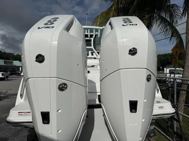 Slide: The Image of 2024 Blackfin 302CC boat interior with seating and table. - 3