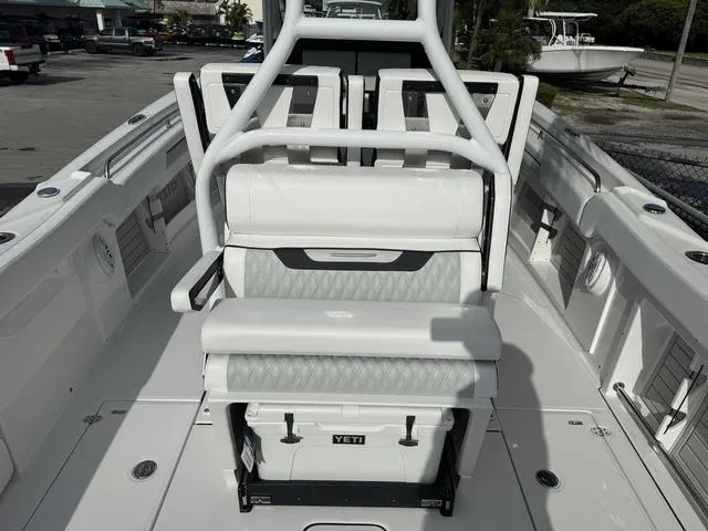 Slide: The Image of 2024 Blackfin 302CC fishing rod storage compartment on deck. - 5