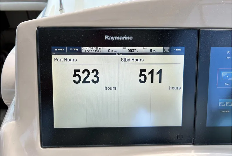 Slide: The Image of Raymarine display showing 523 port hours and 511 starboard hours on a 2002 Sea Ray 280 Sundancer. - 21