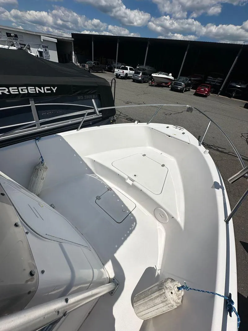 Slide: The Image of 2002 Pro-Line 20 Sport boat bow view at a marina. - 19
