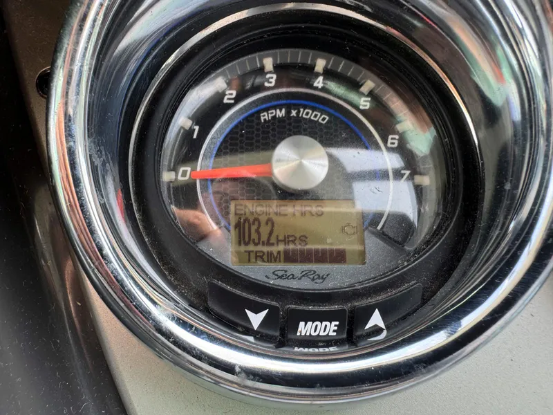 Slide: The Image of Close-up of 2015 Sea Ray 260 Sundancer engine hour meter showing 103.2 hours. - 10