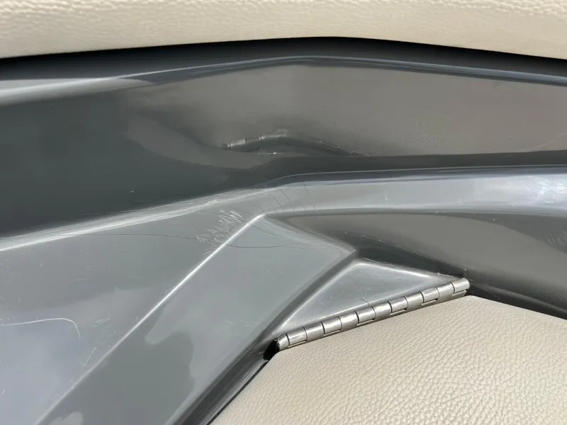 Slide: The Image of Close-up of 2017 Tigé R21 boat interior detail with gray and beige materials. - 16