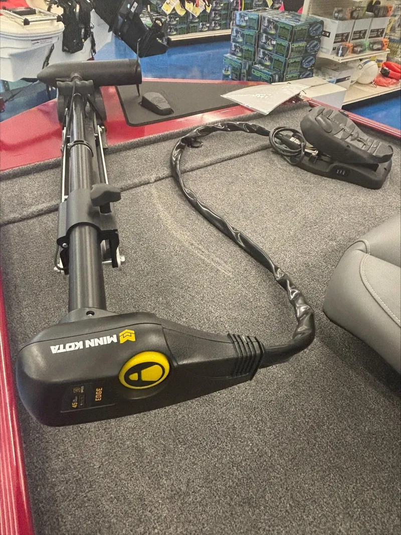 Slide: The Image of 2024 Tracker BT CLASSIC XL boat with Minn Kota trolling motor on deck. - 4