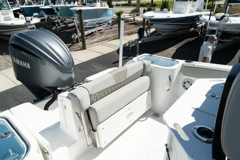Slide: The Image of 2023 Wellcraft 242 Fisherman boat with Yamaha engine at marina. - 12