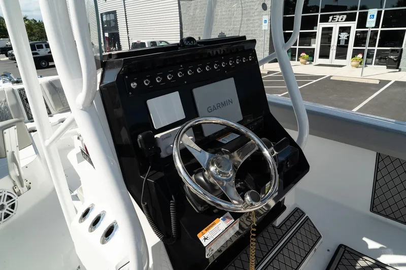 Slide: The Image of 2023 Wellcraft 242 Fisherman boat console with Garmin navigation system. - 21