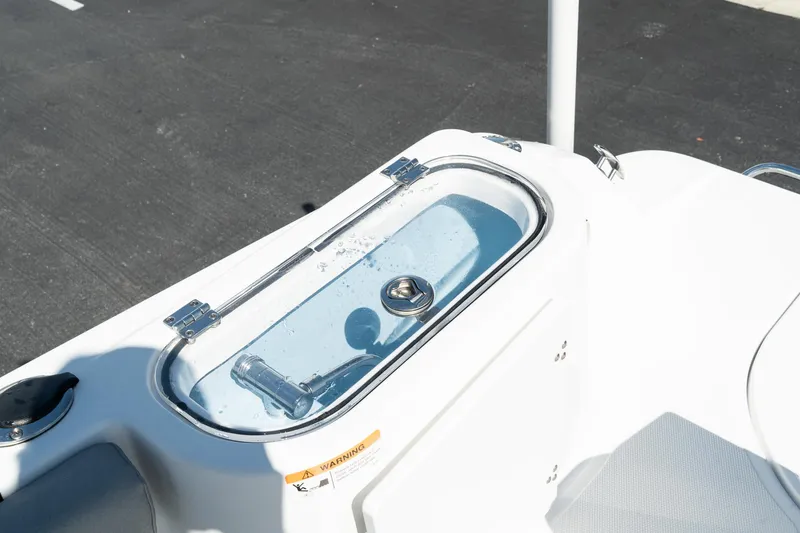 Slide: The Image of Livewell on the 2023 Wellcraft 242 Fisherman boat. - 25