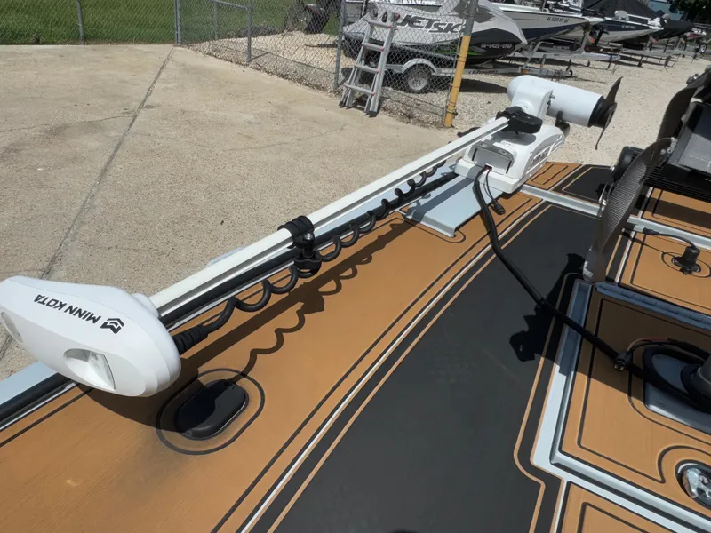 Slide: The Image of 2023 Pro-Drive 22x72 SBX boat with Minn Kota trolling motor on deck. - 10