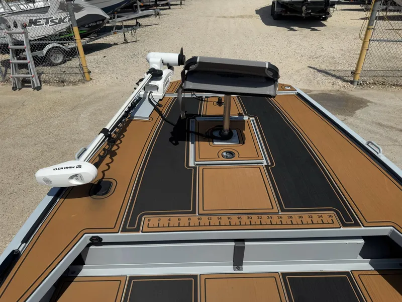 Slide: The Image of 2023 Pro-Drive 22x72 SBX boat deck with trolling motor and seating. - 23