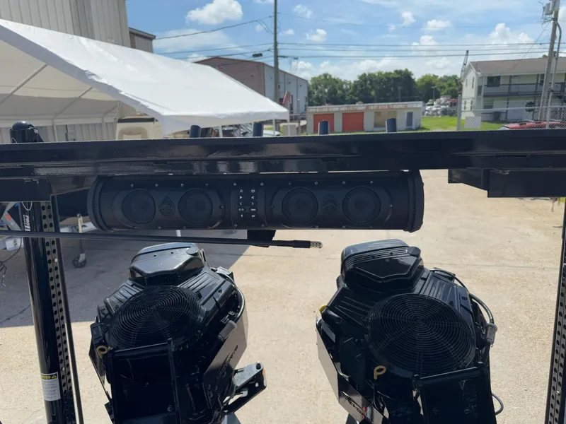 Slide: The Image of Outdoor setup featuring Pro-Drive 22x72 SBX 2023 model with mounted speakers and equipment. - 26