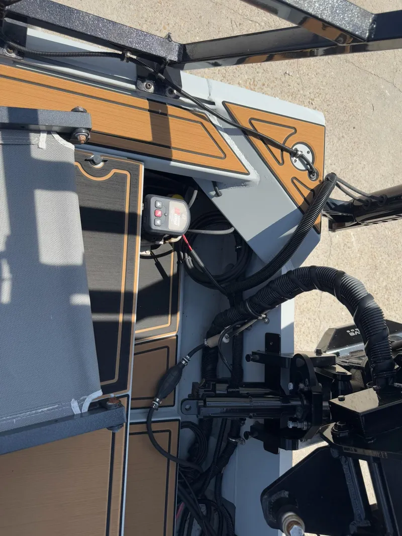 Slide: The Image of 2023 Pro-Drive 22x72 SBX boat interior with control panel and wiring. - 35