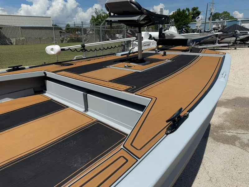 Slide: The Image of 2023 Pro-Drive 22x72 SBX boat with sleek deck design and modern features. - 38