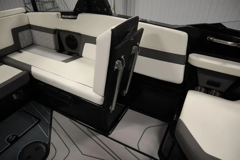 Slide: The Image of 2024 Heyday H22 boat interior with white and black seating. - 10