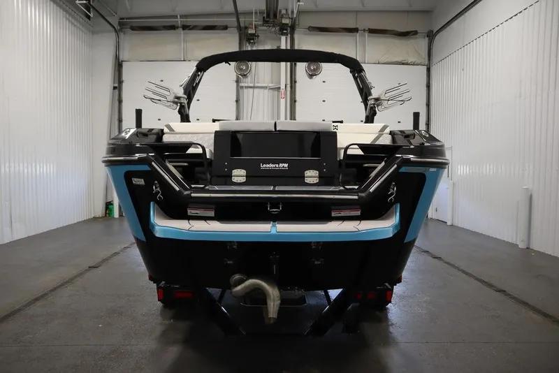 Slide: The Image of 2024 Heyday H22 boat in a storage facility, rear view. - 19