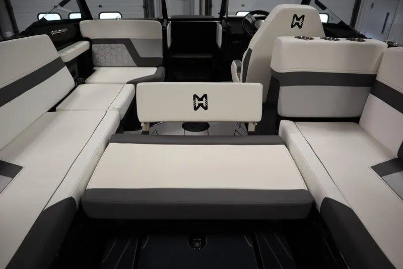 Slide: The Image of 2024 Heyday H22 boat interior with white and gray seating. - 25