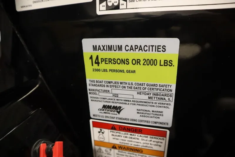 Slide: The Image of 2024 Heyday H22 boat capacity label: 14 persons or 2000 lbs. - 35