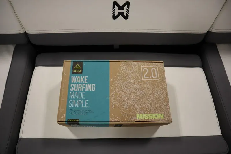 Slide: The Image of Box of Delta 2.0 wake surfing equipment on Heyday H22 boat seat, 2024 model. - 48