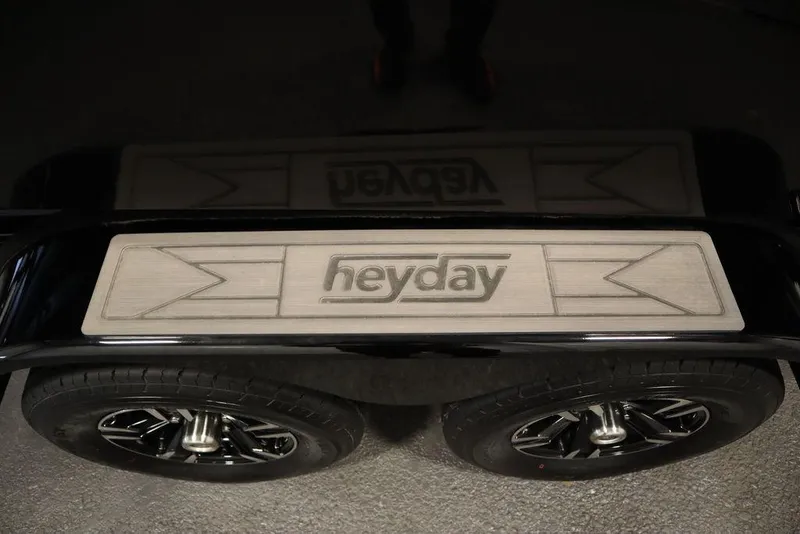 Slide: The Image of 2024 Heyday H22 boat trailer with branded step pad and dual wheels. - 51