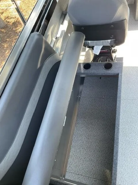 Slide: The Image of 2024 Spartan 220 Maximus interior seating and console detail. - 13