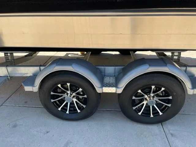 Slide: The Image of 2024 Spartan 220 Maximus trailer with dual black alloy wheels. - 4