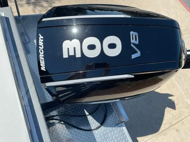 Slide: The Image of Mercury V8 engine on a 2024 Spartan 220 Maximus boat. - 7