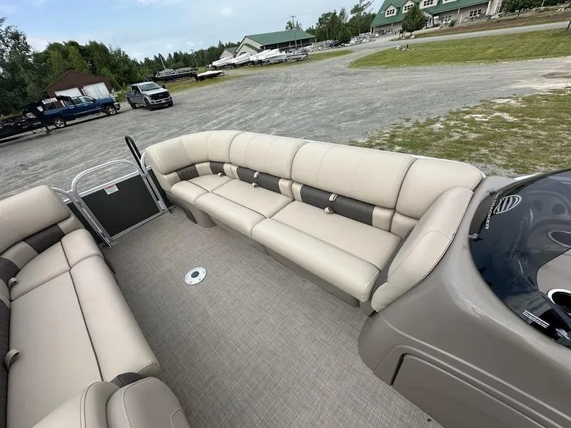 Slide: The Image of 2021 Sun Tracker PB 24 DLX pontoon boat with spacious seating and modern design. - 8