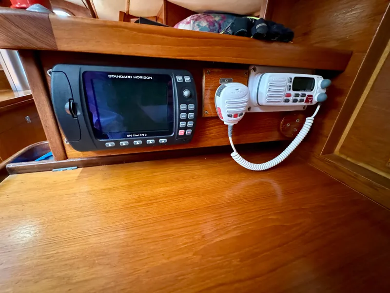 Slide: The Image of 1988 Beneteau First Class 12 yacht interior with kitchen and dining area. - 18