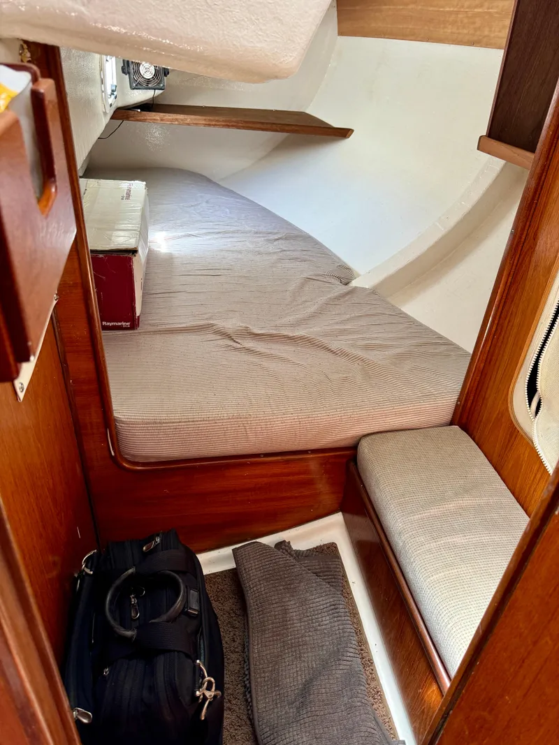 Slide: The Image of Wooden interior of 1988 Beneteau First Class 12 yacht with sink and mirror. - 20