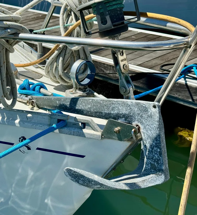 Slide: The Image of Anchor and ropes on a 1988 Beneteau First Class 12 sailboat. - 29
