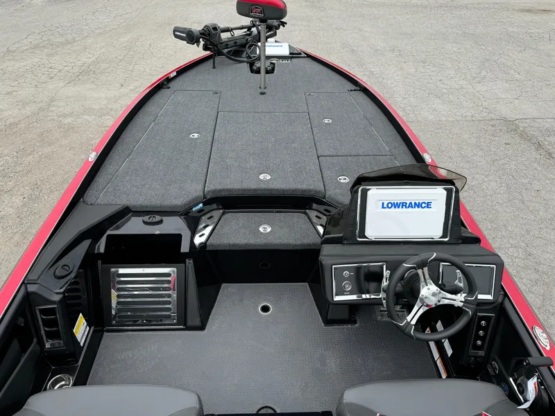 Slide: The Image of 2024 Ranger Z521R boat interior with Lowrance electronics and steering wheel. - 18