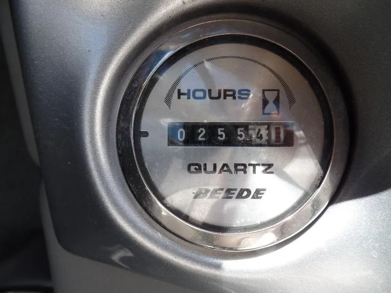 Slide: The Image of 2003 Supra 21 hour meter showing 255.4 hours, Beede Quartz gauge. - 11