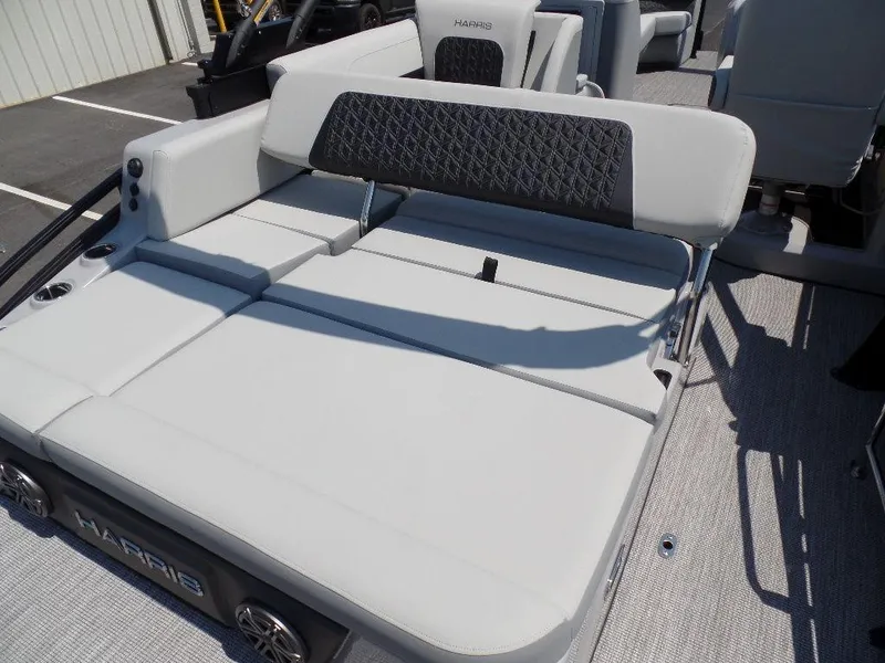 Slide: The Image of 2025 Harris Solstice 250 boat interior with luxurious seating and modern design. - 12