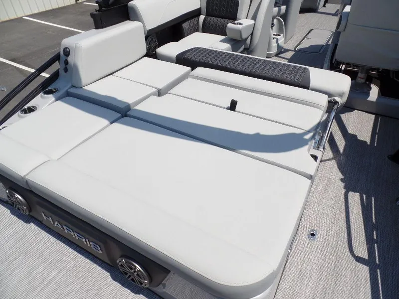 Slide: The Image of 2025 Harris Solstice 250 boat with spacious seating and modern design. - 14