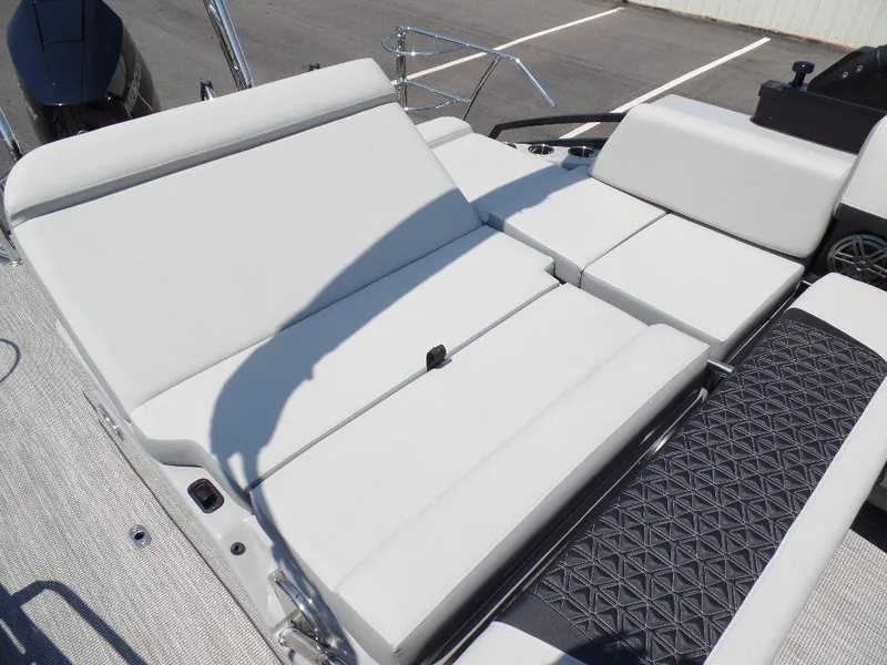 Slide: The Image of 2025 Harris Solstice 250 boat with luxurious white seating and modern design. - 16