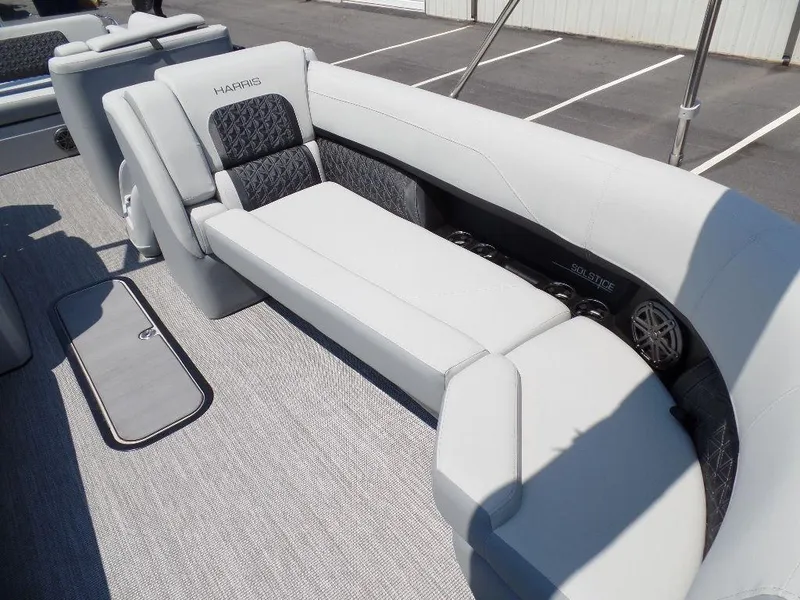 Slide: The Image of 2025 Harris Solstice 250 boat interior with luxurious seating and modern design. - 4