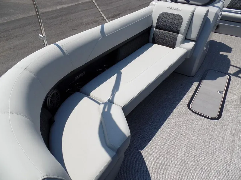 Slide: The Image of 2025 Harris Solstice 250 boat interior with luxurious seating and modern design. - 5