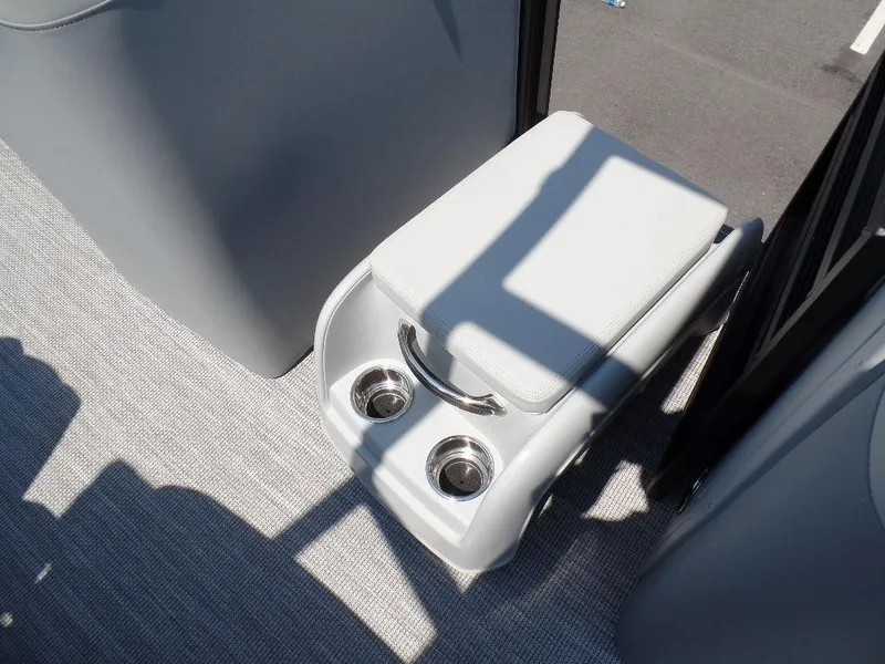 Slide: The Image of 2025 Harris Solstice 250 boat interior with cup holders and cushioned seat. - 7