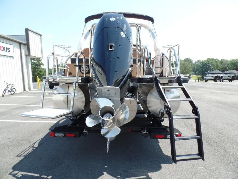 Slide: The Image of 2025 Harris Grand Mariner 250 boat rear view with powerful outboard motor. - 1