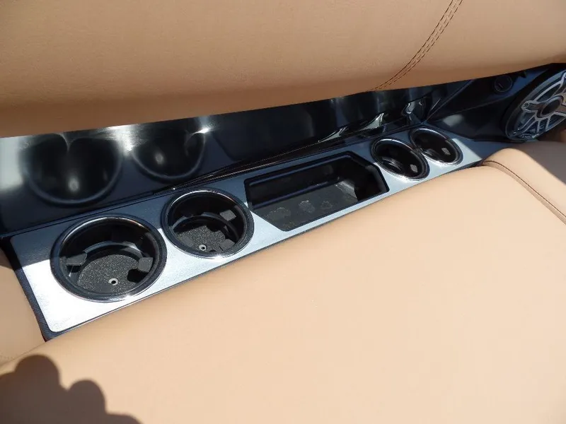 Slide: The Image of Cup holders and storage on 2025 Harris Grand Mariner 250 boat with beige seating. - 6