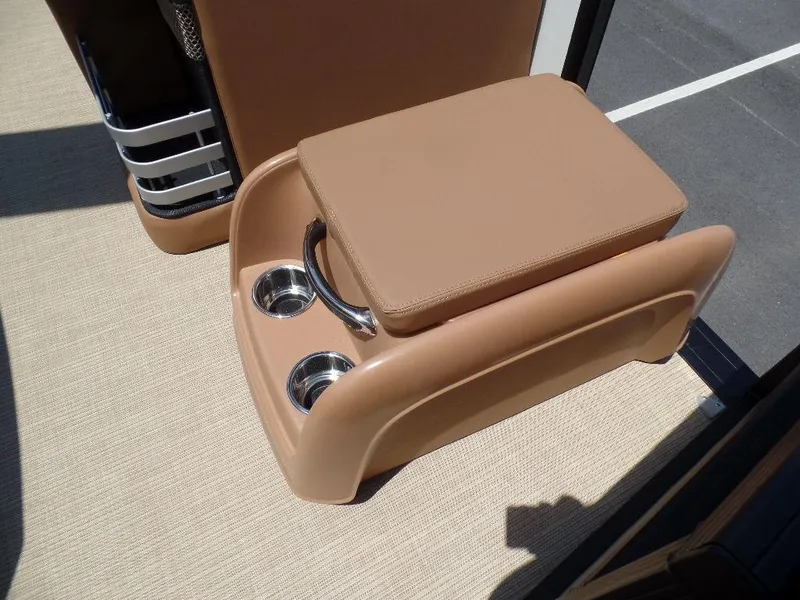 Slide: The Image of 2025 Harris Grand Mariner 250 boat seat with cup holders and beige upholstery. - 8