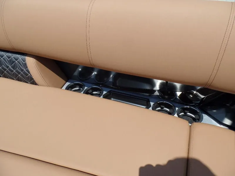 Slide: The Image of Luxurious seating and cup holders on 2025 Harris Grand Mariner 250 boat. - 5