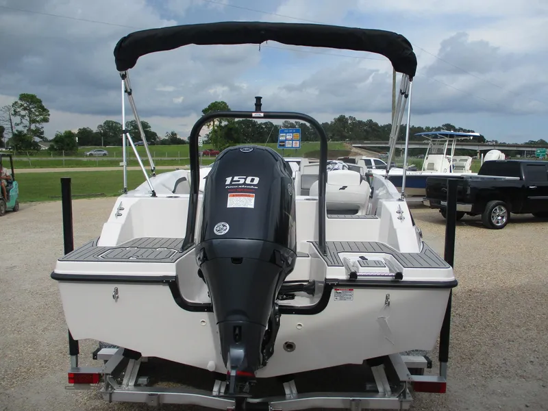 Slide: The Image of 2025 Starcraft SVX191 boat with 150 HP outboard motor, rear view. - 4