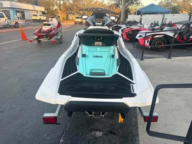 Slide: The Image of 2024 Yamaha Marine Waverunner FX HO dashboard with audio controls and warning label. - 5